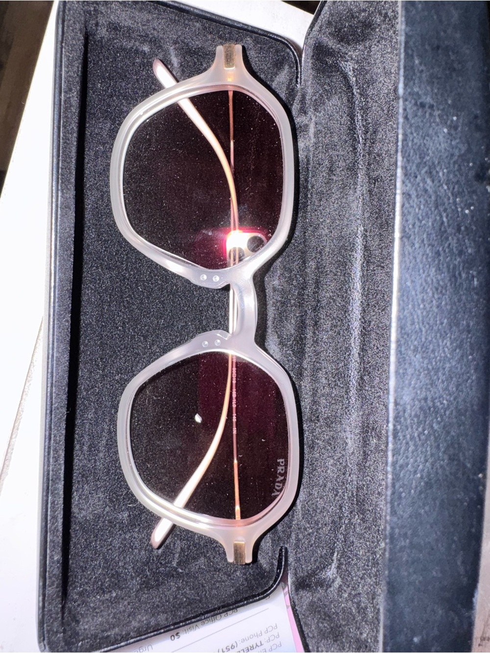 Prada Translucent Pink Frame Sunglasses with Rose Gradient Lenses